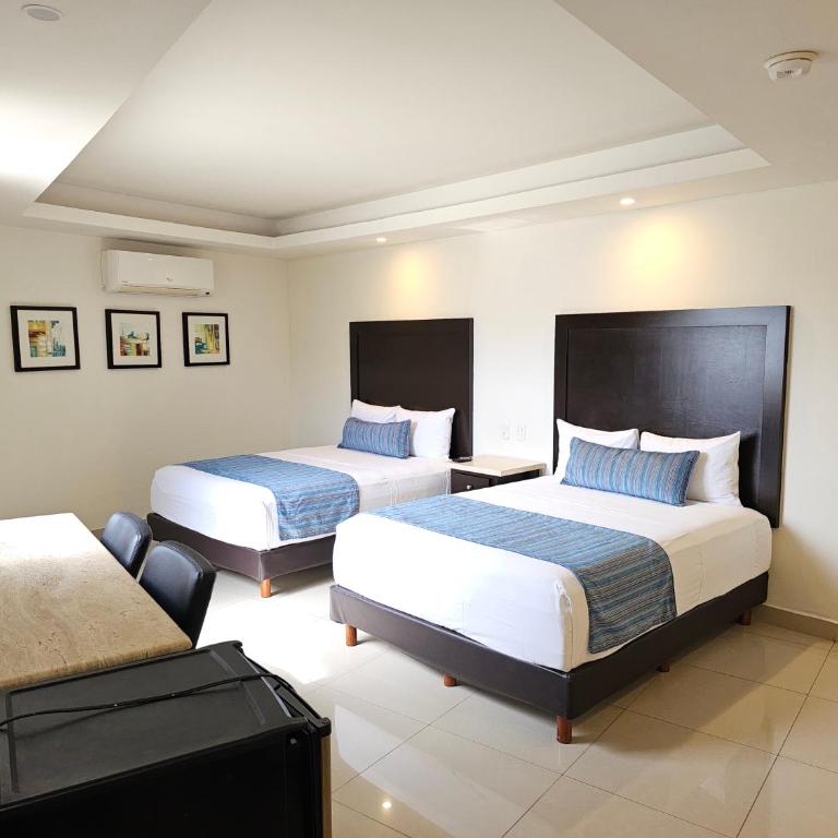 Hotel Maria Elena - Habitación Doble - 2 camas dobles - 1
