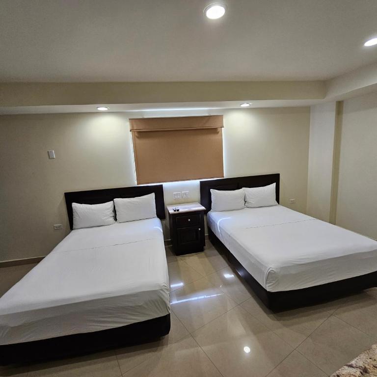 Hotel Maria Elena - Habitación Doble - 2 camas dobles - 7