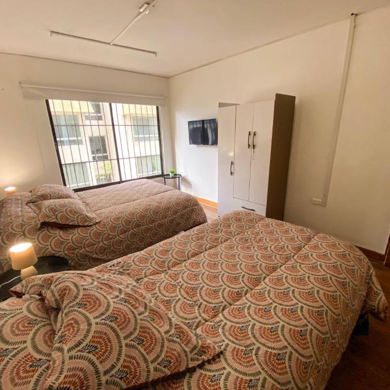 Hostal EntreOrientes - Habitación Cuádruple con baño privado - 8
