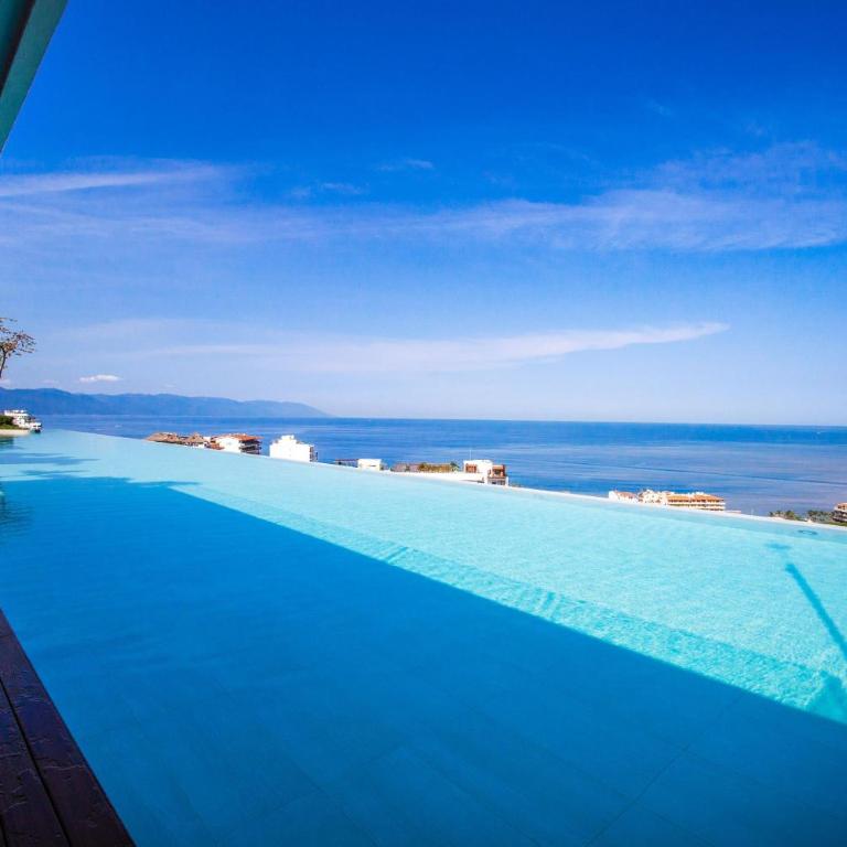 Luxury 1BR + Flex + Heated Rooftop Pool in Soho PV - Vacation Home - 36