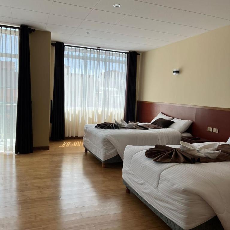 Hostal Alvasar - Habitación Doble Deluxe - 2 camas dobles - 4