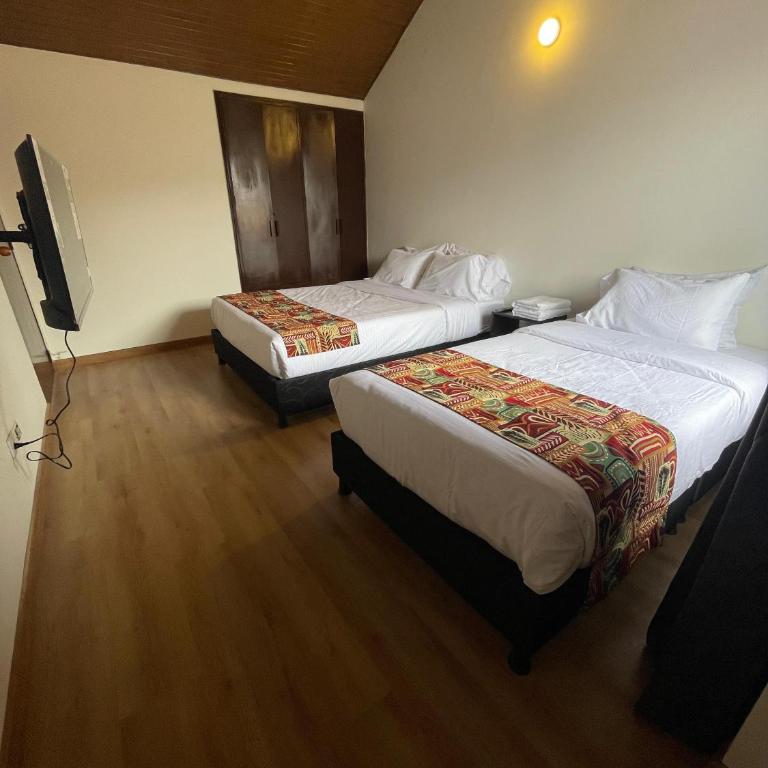 Bamuka Hostal - Habitación Doble con baño compartido - 2 camas - 3