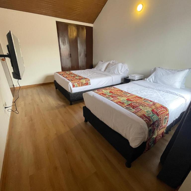 Bamuka Hostal - Habitación Doble con baño compartido - 2 camas - 9