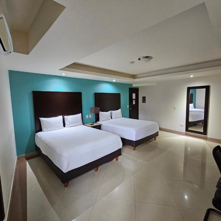 Hotel Maria Elena - Habitación Doble - 2 camas dobles - 12