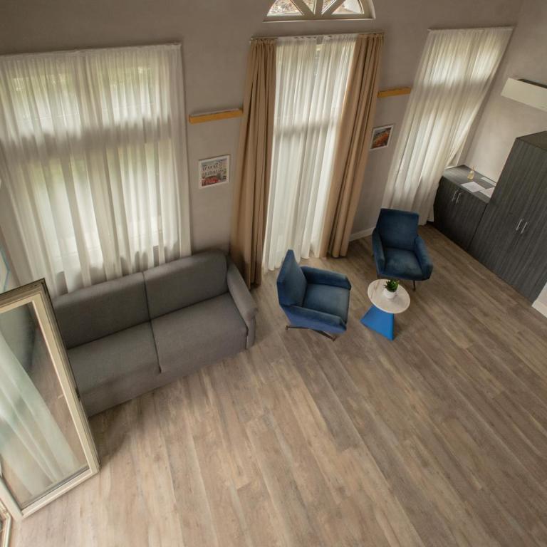 Hotel Al Campanile - Luxury Suites & Apartments - Camera Familiare con Vista Lago - 13