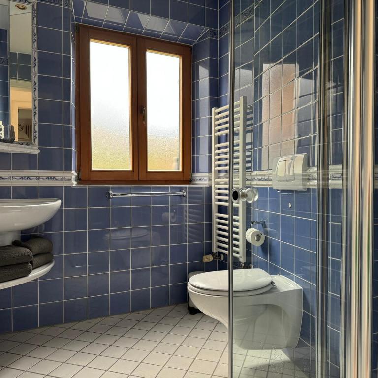 Alpenflair Apartments - Deluxe Doppelzimmer mit Balkon - 9