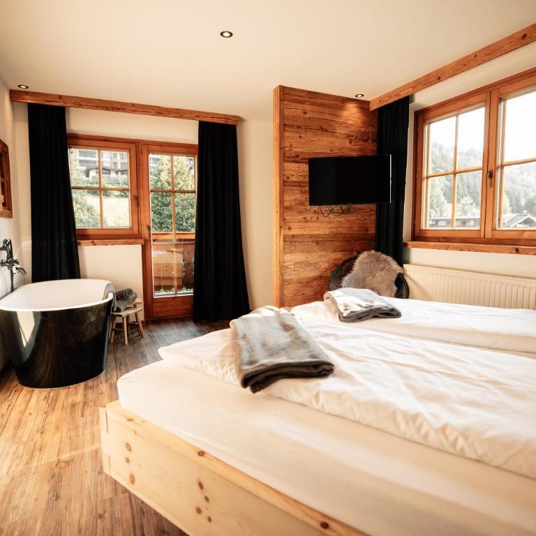 Hotel Sonnberg - Chalet-Suite mit Badewanne und Küchenzeile - 9