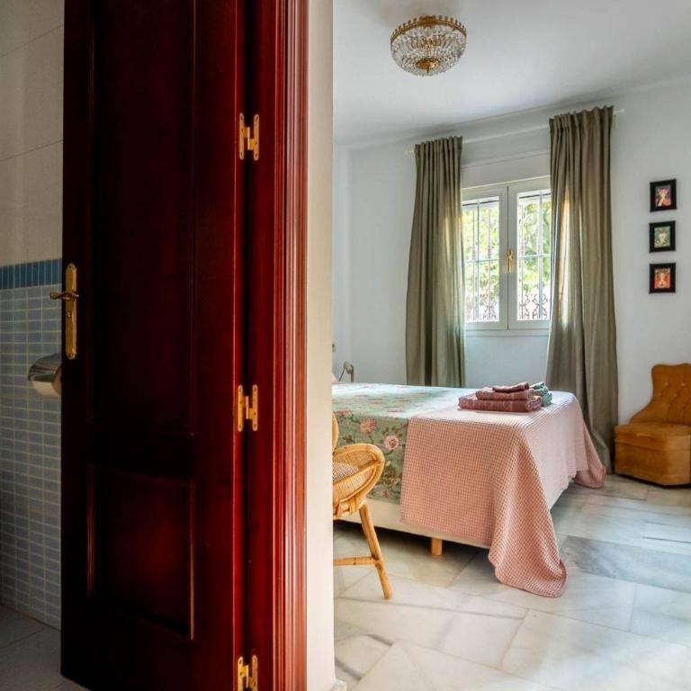 Piso con patio privado y parking Nervión Sevilla - Apartamento - 27
