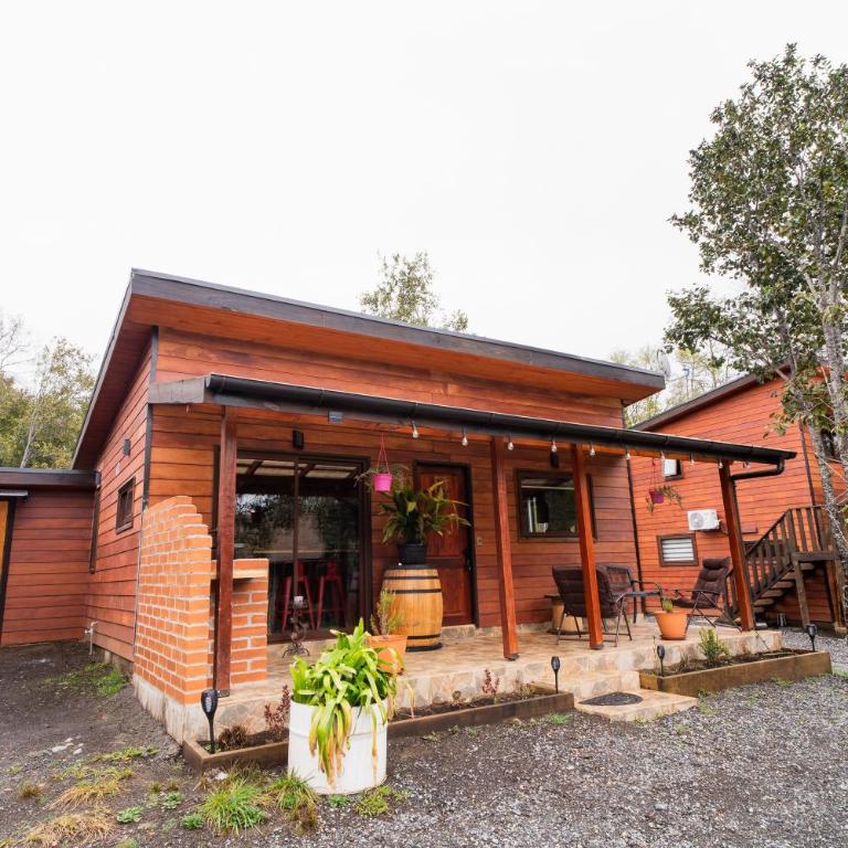 Pucón Rec-Lodge Cabaña Loro Tricahue - Two-Bedroom House - 1