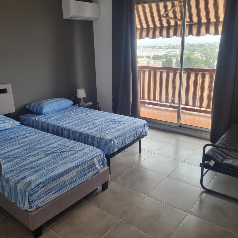 F3 ,appartement climatisé neuf, magnifique vue sur mer et aéroport, proche tram et gare sncf 1 min,aéroport 3 minutes, 3 rooms, new AC apartment, magnificent sea and airport views, close to tram and SNCF train station 1 min, airport 3 min - Apartment mit 2 Schlafzimmern und Meerblick - 15