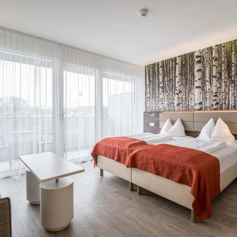 Eco Suite Hotel - Deluxe Doppel-/Zweibettzimmer mit Balkon - 1