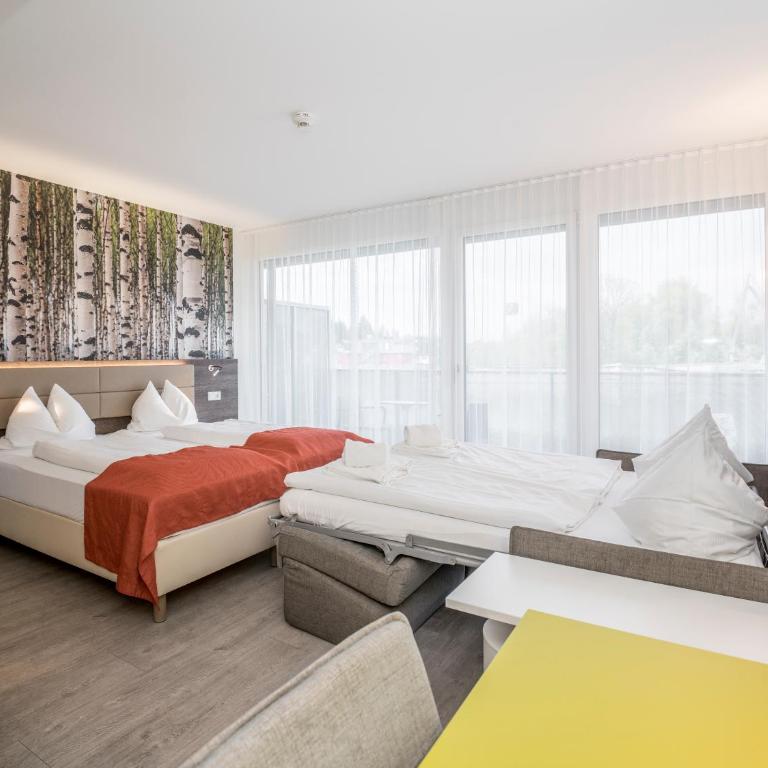 Eco Suite Hotel - Deluxe Doppel-/Zweibettzimmer mit Balkon - 4