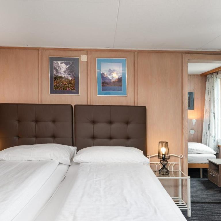 Jungfrau Lodge, Swiss Mountain Hotel - Dreibettzimmer mit eigenem Bad und Blick auf den Eiger - 6