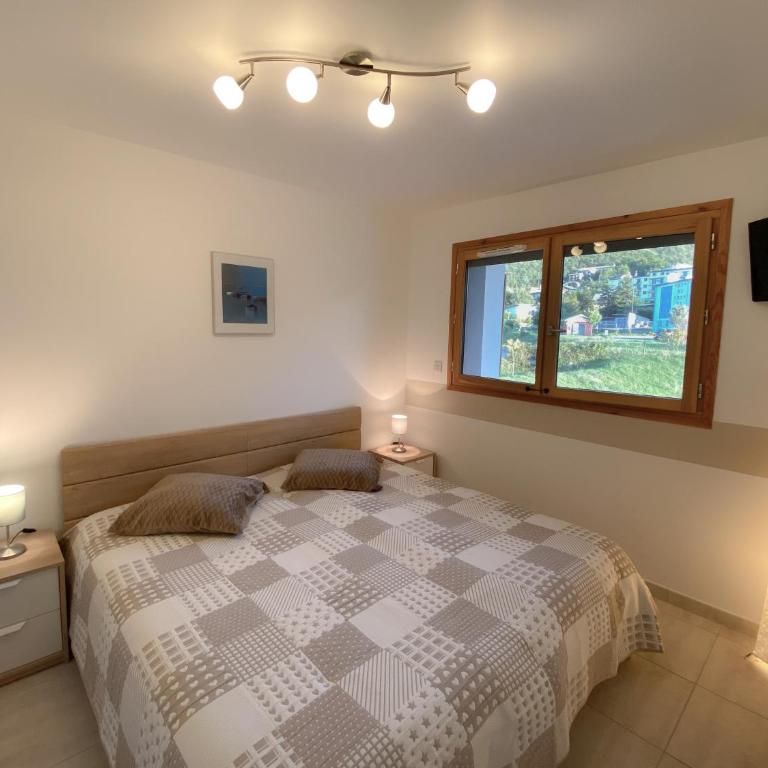 La terrasse au bord du Lac, vue panoramique lac et montagnes , 2 ch, linge et ménage inclus - Appartement - 5