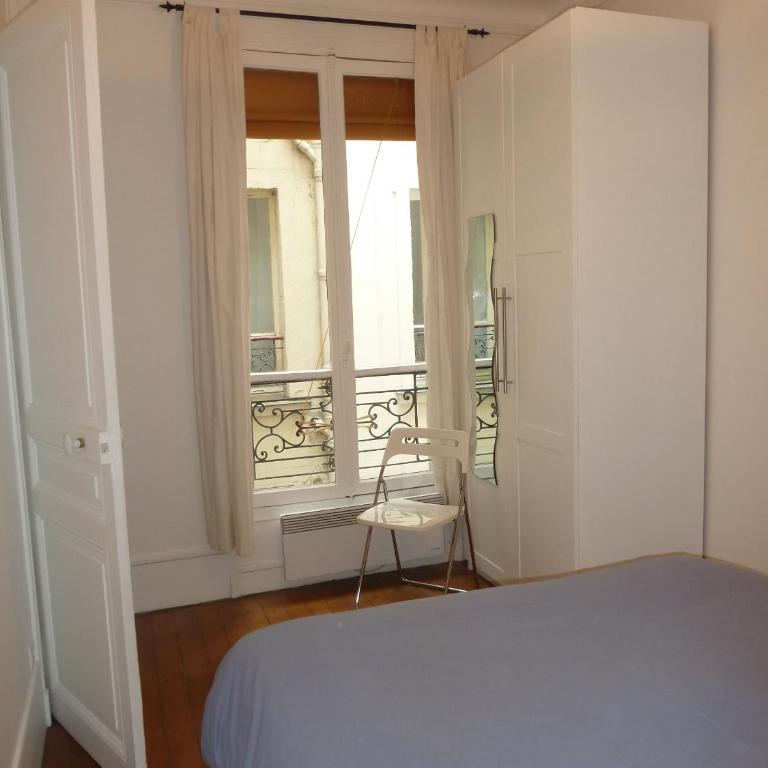 Au coeur de Paris - One-Bedroom Apartment - 10