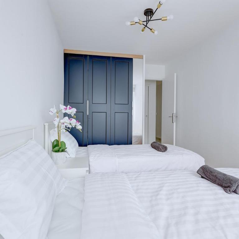 Suite au Cœur de Paris, Architecturale et Élégante - Appartement 3 Chambres - 14