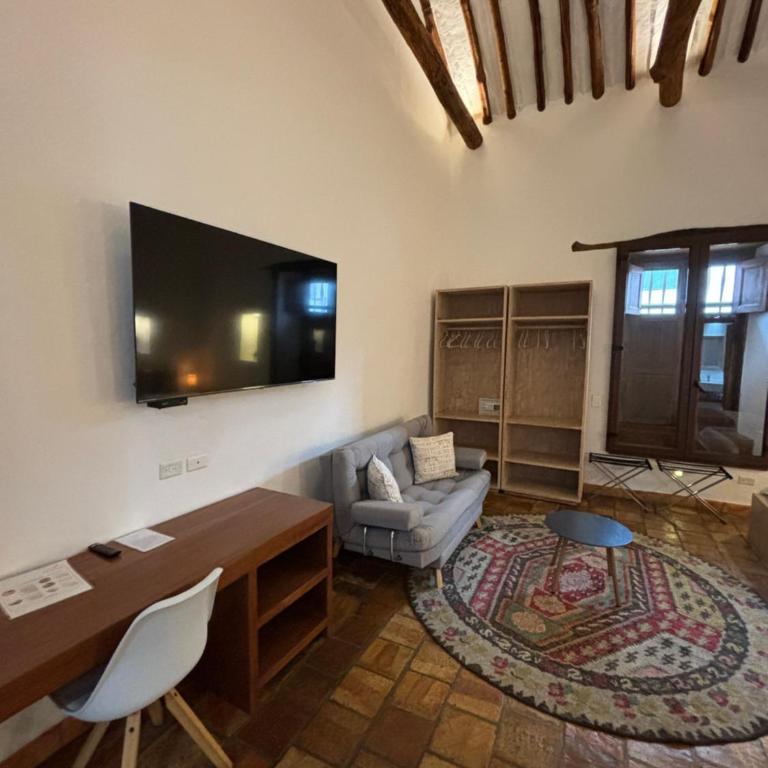 Santa Sofia Casa Boutique - Habitación Familiar con vistas al jardín - 5
