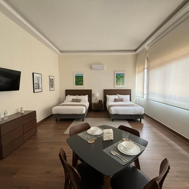 Casa Herrmann Suites - Habitación Doble Deluxe - 2 camas dobles - 3