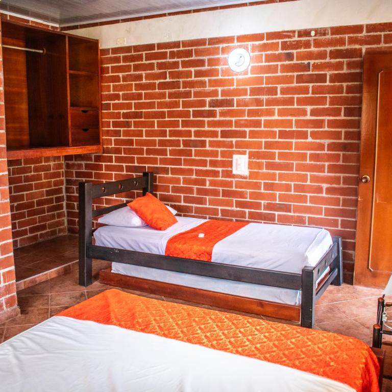 Club Bella Suiza - Carlos Ossa Escobar - Villavicencio - Quadruple Room - 1