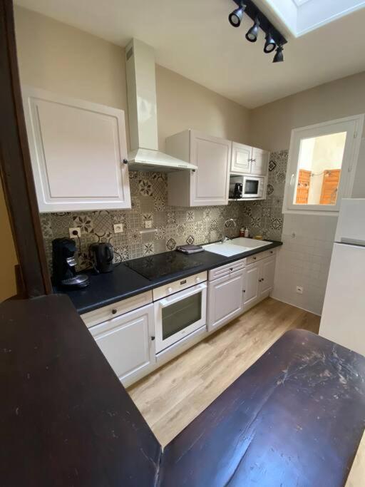 Appartement charmant hypercentre avec patio privé et parking - Room #1184269701 - 14