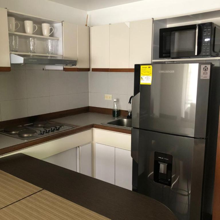 Cómodo Apartaestudio en super ubicación - Suite Superior con cama extragrande - 8