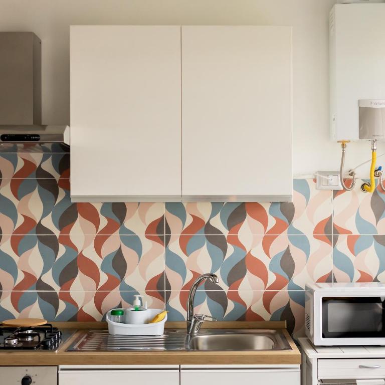 StepaHouse Roma zona San Paolo Elegante Bilocale a 2 minuti dalla Metro B - Appartamento Deluxe con 1 Camera da Letto e Vista Città - 89