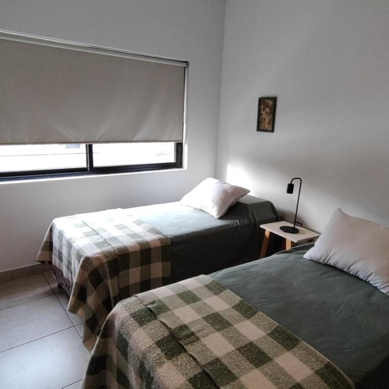 Apart Centro Paraná Apartamento entero 90m2, cochera privada para auto, excelente ubicación, a mts del Shopping Paso del Paraná, zona Parque y Peatonal - Two-Bedroom Apartment - 5