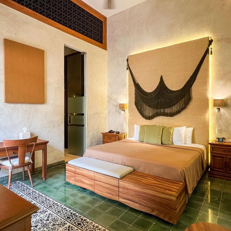 Ya'ax Hotel Boutique - Suite con cama extragrande - 17