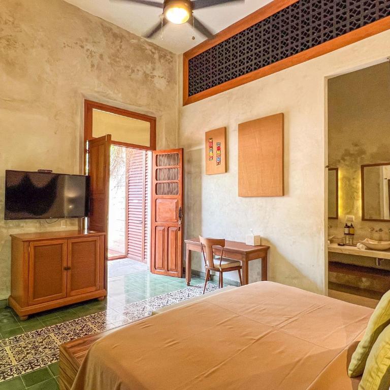 Ya'ax Hotel Boutique - Suite con cama extragrande - 18