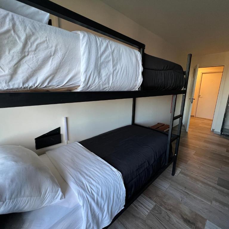 Viajero Calafate Hostel - Cama en habitación compartida mixta de 6 camas - 1