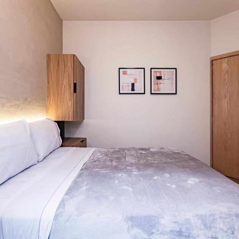 Suites Monterrey by Escajal Rooms - Habitación Deluxe - 2