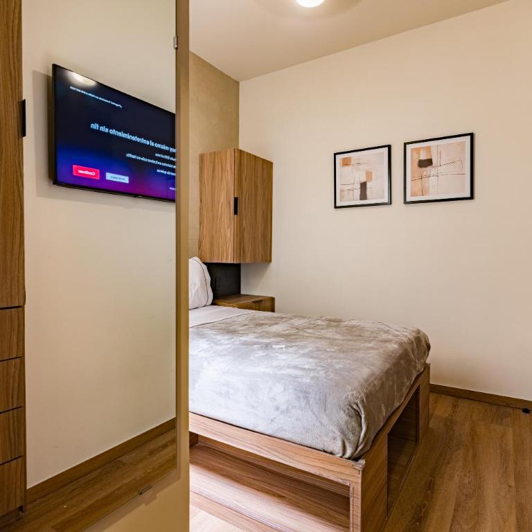 Suites Monterrey by Escajal Rooms - Habitación Deluxe - 8