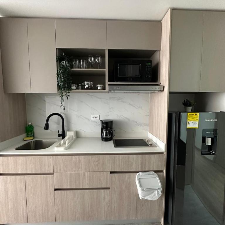 Confort y estilo en cada detalle en Corferias - Apartamento de 1 dormitorio - 12