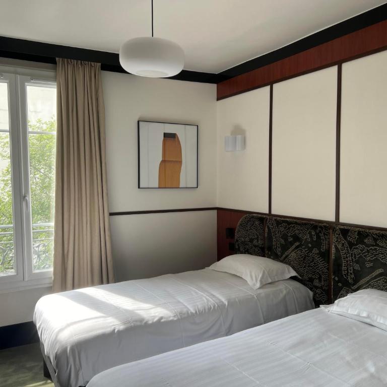 Hôtel Marguerite - Chambre Lits Jumeaux - 3
