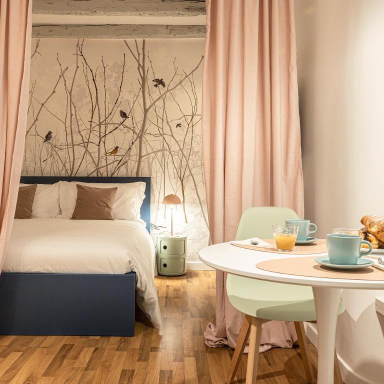 Piazza Unità d'Italia - Jr Suite con AC - Wi Fi - Park Convenzionato - Appartamento con 1 Camera da Letto - 1