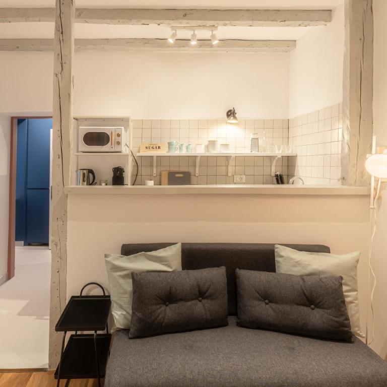 Piazza Unità d'Italia - Jr Suite con AC - Wi Fi - Park Convenzionato - Appartamento con 1 Camera da Letto - 13