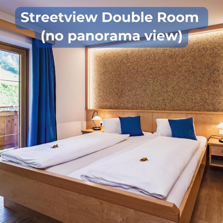 Panorama Hotel Guggenbichl - inkl Sommerkarte, einmaliger Eintritt ins Tauern Spa & bester Ausblick über Kaprun - Doppelzimmer mit Balkon mit kostenlosem Eintritt ins Tauern Spa - 3
