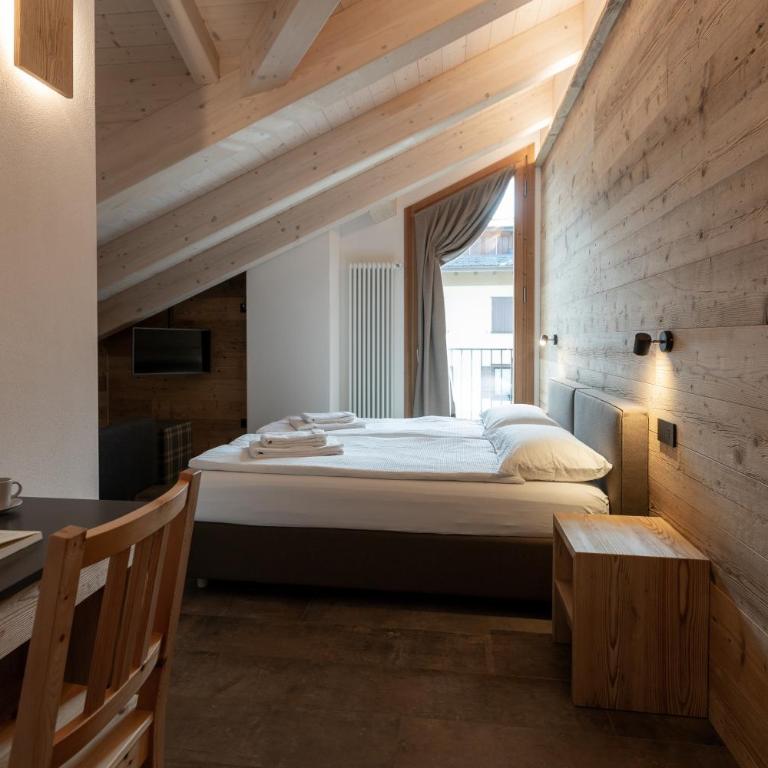 BAITA LARIX Sauna&Relax - Camera Matrimoniale/Doppia con Letti Singoli con Vista Montagna - 9