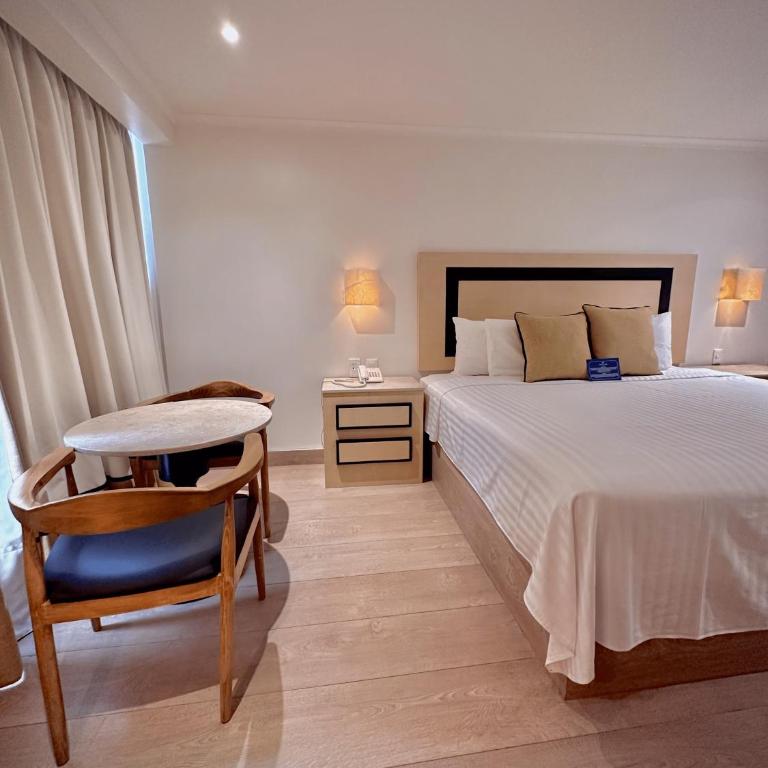 Hotel Stella Maris - Habitación Deluxe con cama extragrande - 6