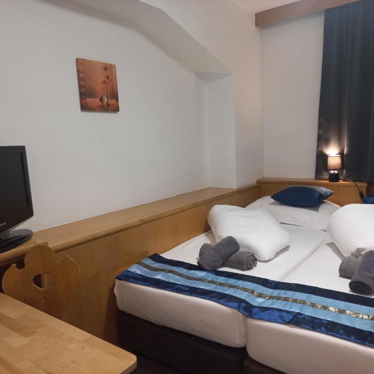Hotel Untermetzger - Kleines Zweibettzimmer - 1