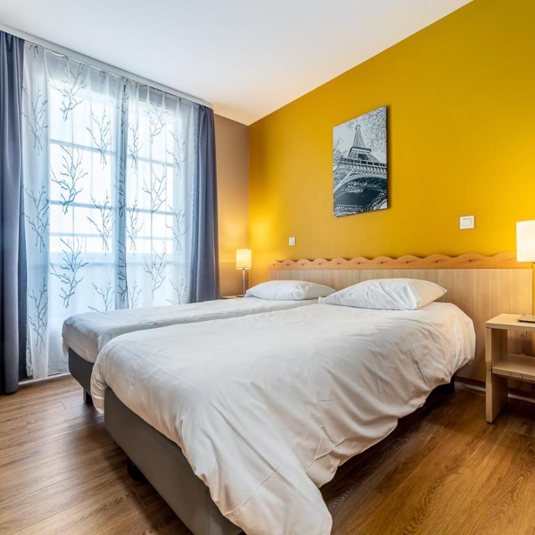 Disneyland Appartements familial avec piscine intérieur chauffé, parking gratuit A 5 minutes des parcs - Apartment - auf 2 Etagen - 7