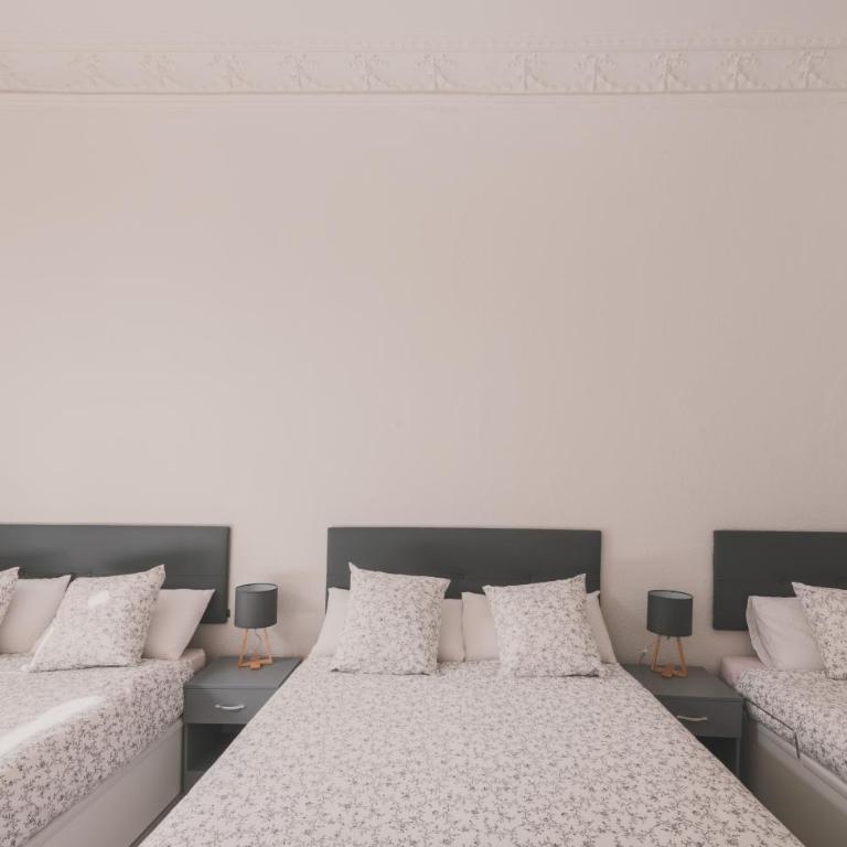 Amplio Piso de 7 habs, 4 baños sobre calle Gran Vía - Apartment - 85