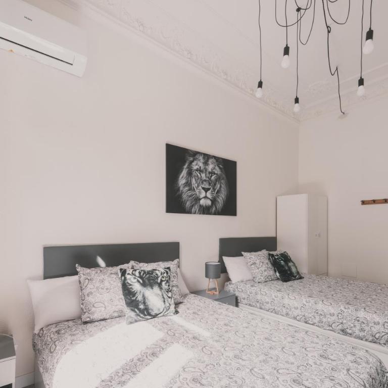 Amplio Piso de 7 habs, 4 baños sobre calle Gran Vía - Apartment - 86