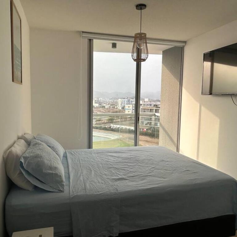 Departamento de playa con piscinas en condominio - Three-Bedroom Apartment - 10