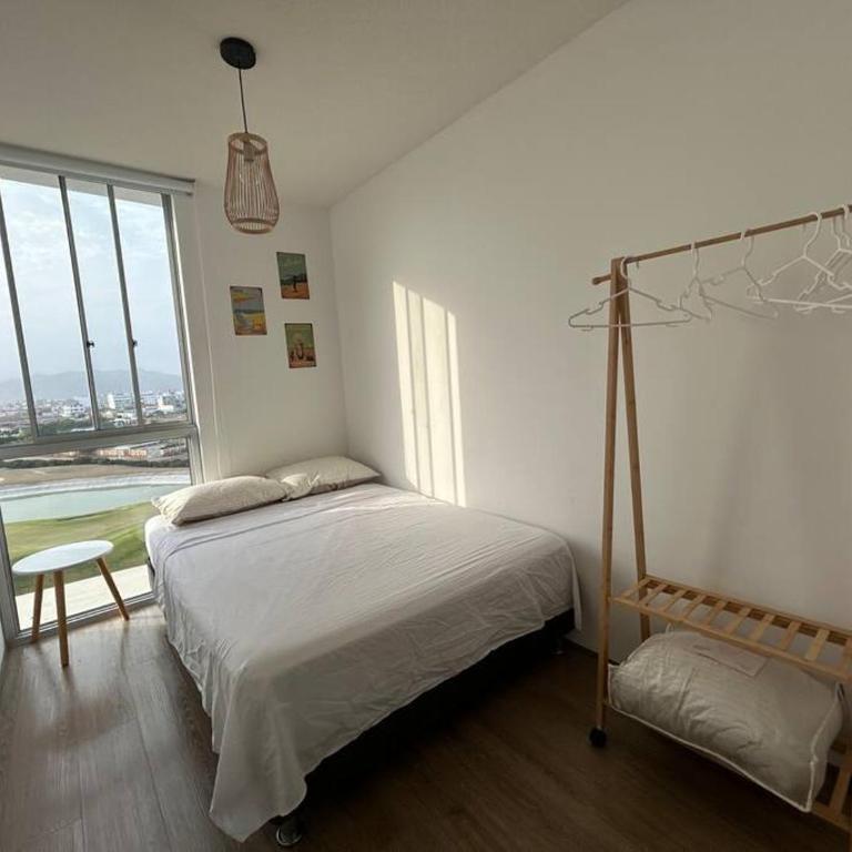 Departamento de playa con piscinas en condominio - Three-Bedroom Apartment - 11