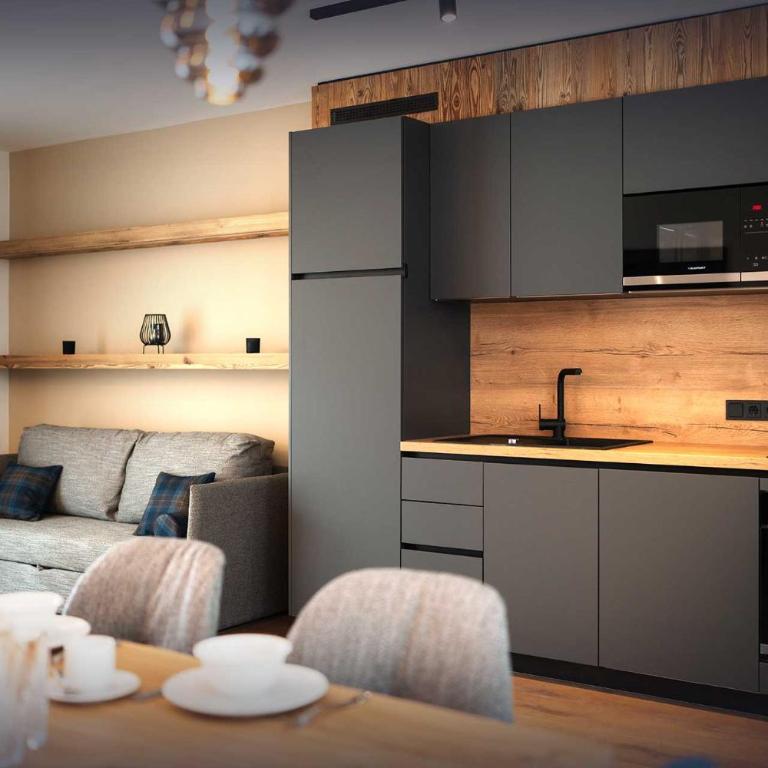Apartment Hotel Schneerose - Apartment mit 1 Schlafzimmer, eigener Sauna und Bergblick - 4