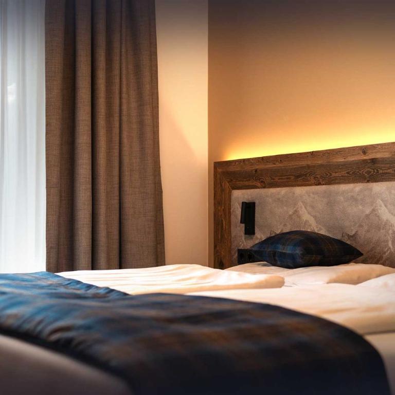 Apartment Hotel Schneerose - Apartment mit 1 Schlafzimmer, eigener Sauna und Bergblick - 1