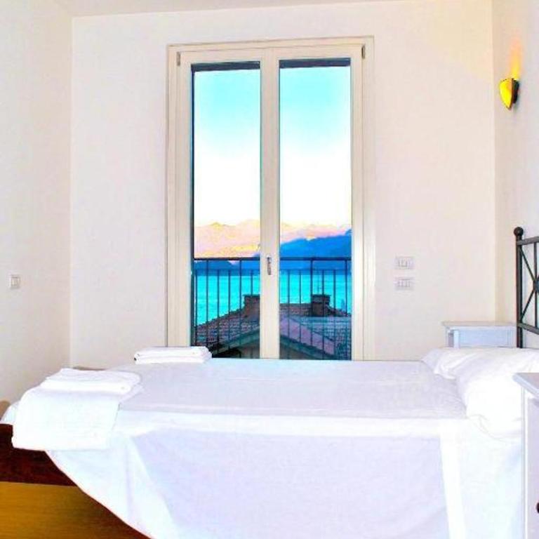 Attico Con Grande Terrazza vista Lago - Appartamento con 2 Camere da Letto - 20