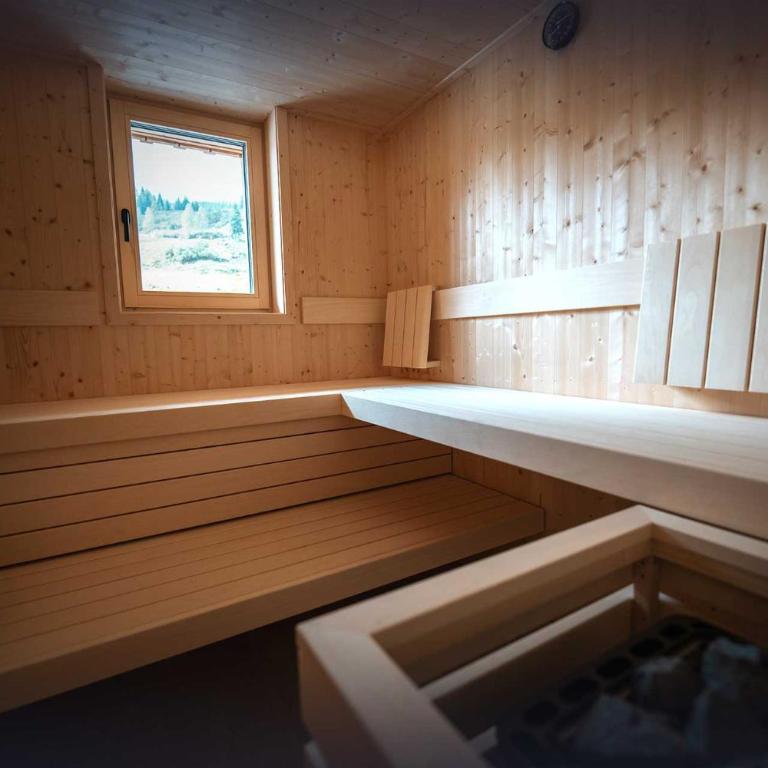 Apartment Hotel Schneerose - Apartment mit 2 Schlafzimmern, eigener Sauna und Bergblick - 9