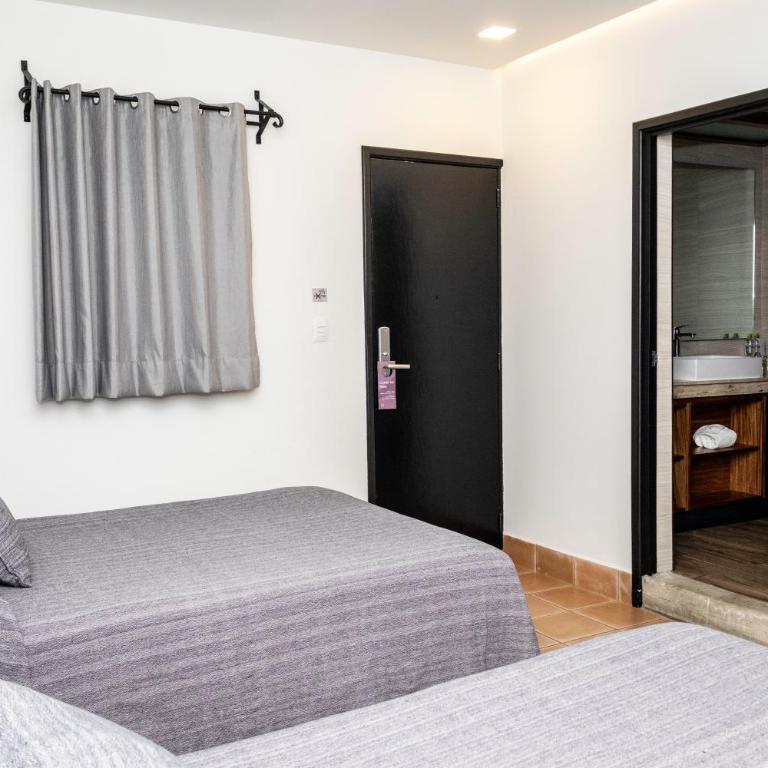 Hotel Boutique Naura Centro - Habitación Doble Estándar con 2 camas dobles - 8